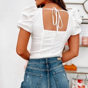 White puff sleeve bodysuit.